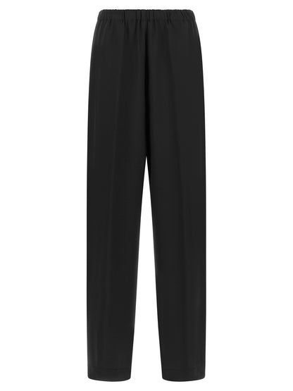 Trousers by Fabiana Filippi for women in virgin wool & polyamide black & signature features an on trend silhouette, showcasing a sophisticated relaxed-fit with a long and for an on trend finish.