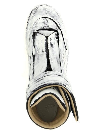 Athletic Sneakers by Maison Margiela for men in calfskin leather bicolour, black & white features an timeless silhouette from the Men's Athletic Calfskin Leather Sneakers collection, showcasing a timeless athletic style for a timeless look.