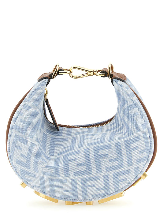 Mini Hobo Handbag by Fendi for women in calf leather & cotton brown, gold, light-blue, patterned & monogram features an refined silhouette, showcasing a secure zipper, ample , and versatile adjustable-strap for a sophisticated refined aesthetic.