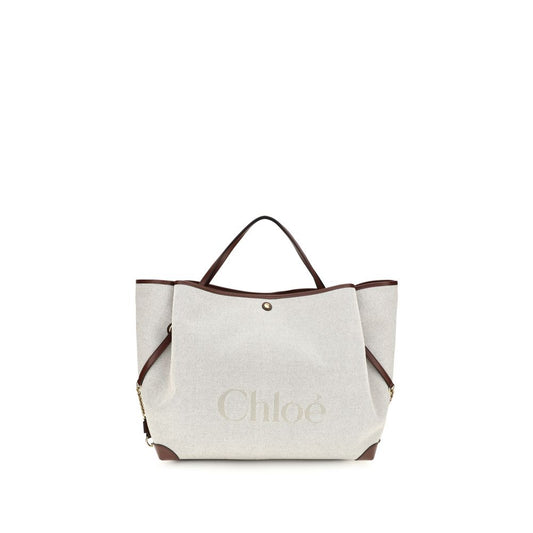 Large Shoulder Tote Bag by Chloé for women in cotton canvas beige & jacquard features a effortless chic silhouette with a secure , ample , and versatile shoulder-strap & handle for a effortless chic finish.