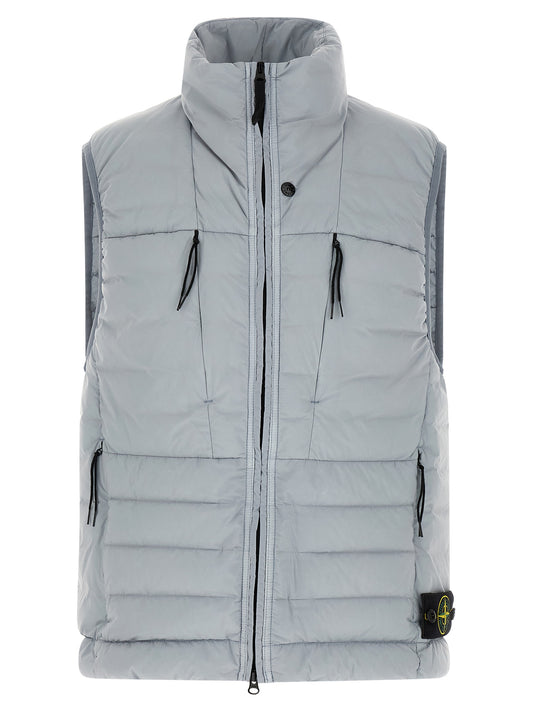Vest by Stone Island for men in stretch polyamide gray showcases a utilitarian silhouette, artfully incorporating lightweight, pockets & insulated and a utilitarian high-collar neckline for a truly utilitarian finish.