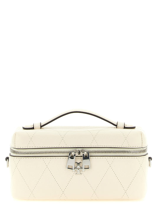 Crossbody Quilted Vanity Handbag by Tory Burch for women in leather cream, silver, white & signature features a versatile chic silhouette, meticulously detailed with a secure zipper, ample built-in-compartments & cardholder, and versatile crossbody-strap, shoulder-strap, handle & detachable-strap.