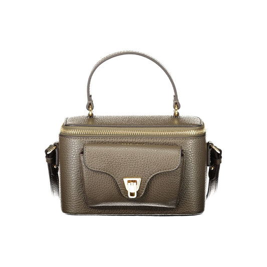 Handbag by Coccinelle for women in leather brown & signature features an refined silhouette, showcasing a secure zipper, ample external-pockets, and versatile shoulder-strap, handle & adjustable-strap for a sophisticated refined aesthetic.