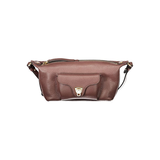 Handbag by Coccinelle for women in leather brown & signature features a ornamental silhouette, showcasing a secure zipper, ample external-pockets, and ornamental shoulder-strap & adjustable-strap for a sophisticated look.