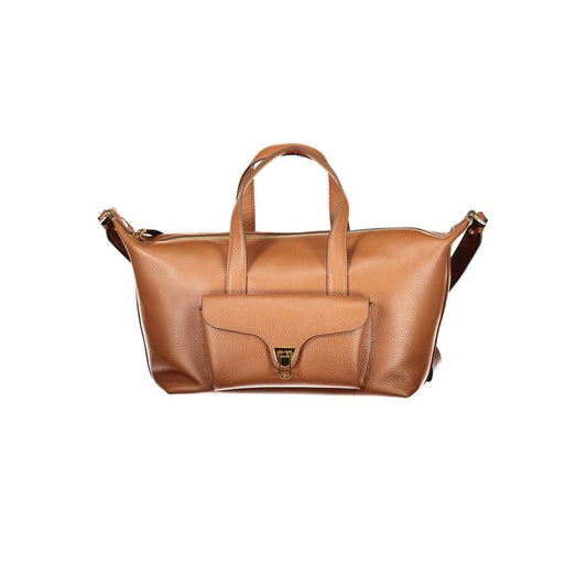 Handbag by Coccinelle for women in leather brown, signature & print features an refined silhouette, showcasing a secure zipper, ample document-holder, external-pockets & internal-pockets, and versatile shoulder-strap, handle & adjustable-strap for a sophisticated refined aesthetic.
