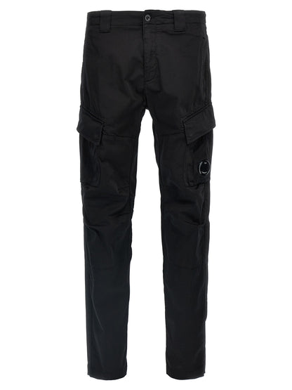 Cargo Pants by C.P. Company for men in stretch cotton black & signature features an urban chic straight-leg with a and long, creating a urban chic aesthetic for "Moon Behind the Hill".