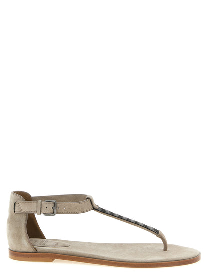 Flat Ankle Strap T-Strap Sandals by Brunello Cucinelli for women in suede calfskin leather beige, gray & signature features an statuesque Monile Women's Suede Calfskin Leather Flat Ankle Strap T-Strap Sandals silhouette with a refined flat and elegant .