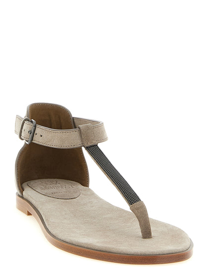 Flat Ankle Strap T-Strap Sandals by Brunello Cucinelli for women in suede calfskin leather beige, gray & signature features an exquisite silhouette, showcasing the exquisite Monile Women's Suede Calfskin Leather Flat Ankle Strap T-Strap Sandals with a flat and .
