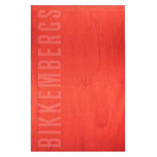 Beach Towel by Bikkembergs for women in cotton red & dots presents a cerebral silhouette, artfully capturing the essence of the cerebral Cotton Beach Towel design for a sophisticated look.