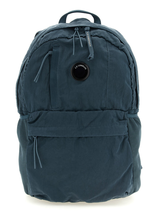 Backpack by C.P. Company for men in lyocell blue presents a stately Lyocell Backpack design, showcasing a secure zipper with ample built-in-compartments & external-pockets and versatile backpack-strap for a stately finish.