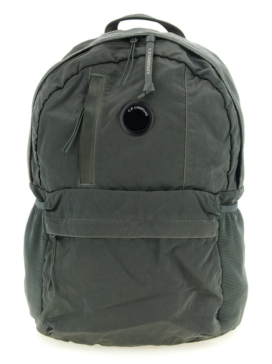 Backpack by C.P. Company for men in lyocell bicolour, green & signature presents a stately Lyocell Backpack design, showcasing a secure zipper with ample built-in-compartments and versatile backpack-strap & adjustable-strap for a stately finish.