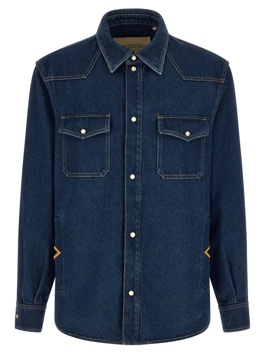Shirt by Valentino Garavani for men in denim cotton blue, pearl & signature presents a discerning silhouette, showcasing a sophisticated and for a truly discerning finish.