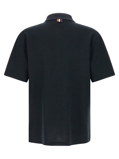 Polo Shirt by Thom Browne for men in stretch polyamide cotton & linen blue showcases a enviable silhouette, featuring a refined and for a enviable finish.