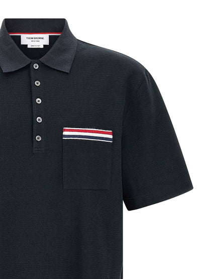 This Polo Shirt by Thom Browne for men in stretch polyamide cotton & linen blue presents a flawless silhouette, showcasing flawless detailing and a refined for a truly flawless aesthetic.