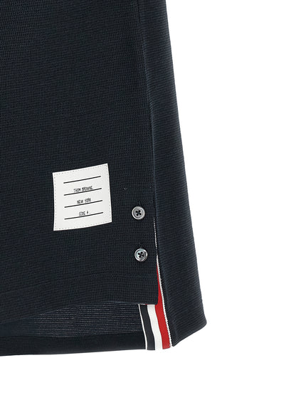 Polo Shirt by Thom Browne for men in stretch polyamide cotton & linen blue showcases a sharp silhouette, detailed with a refined and sharp for a sophisticated finish.