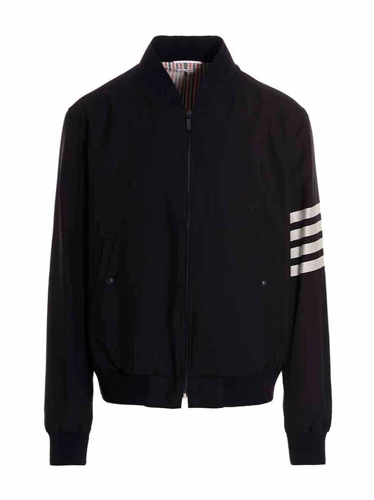 Bomber Jacket by Thom Browne for men in wool blue presents a effortlessly chic silhouette, showcasing a sophisticated and premium pockets for a truly effortlessly chic finish.