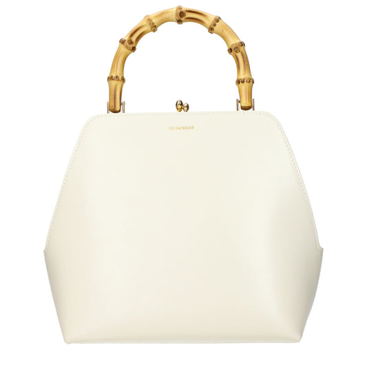 This Handbag by Jil Sander for women in leather and beige presents a sculptural silhouette featuring a secure , ample , and versatile for a sculptural finish.