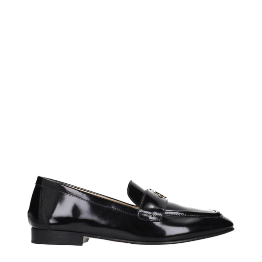 Flat Loafer Slip-On Shoes by Jimmy Choo for women in leather black features an effortless chic silhouette, showcasing the Women's Leather Flat Loafer Slip-On Shoes design with an effortless chic flat and a for a effortless chic look.