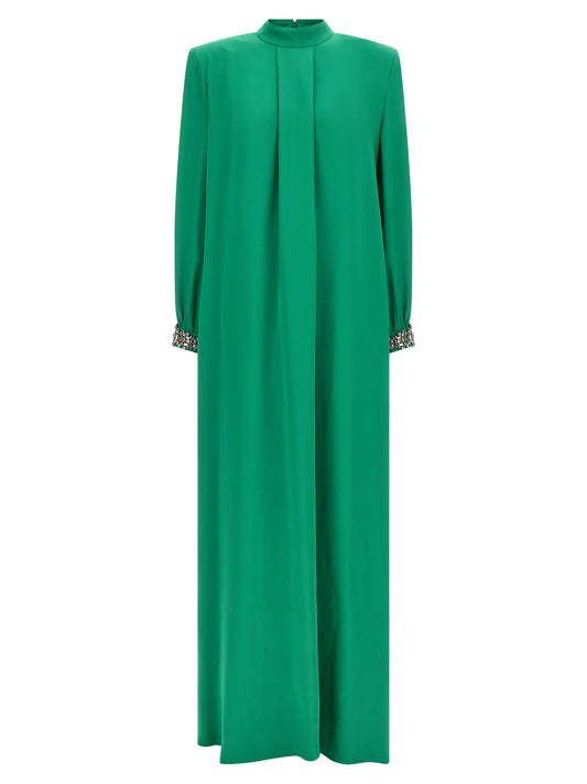 Dress by Valentino Garavani for women in silk & rhinestone bicolour & green features an magnificent silhouette, artfully detailed with a magnificent and that flows into an magnificent long.