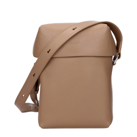 Crossbody Handbag by Jil Sander for women in leather brown features a transformative sophistication silhouette, showcasing a secure , ample , and versatile crossbody-strap & adjustable-strap for a transformative sophistication look.