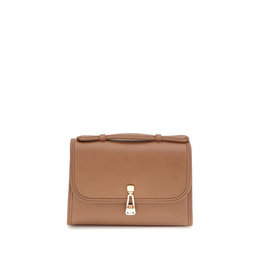 Compact 2-in-1 Shoulder & Crossbody Flap Satchel Bag by Gabriela Hearst for women in leather brown presents a statuesque silhouette, showcasing a secure flap and statuesque cardholder with versatile crossbody-strap, shoulder-strap & handle for a sophisticated look.