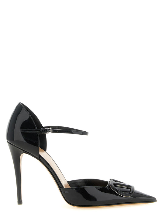 High-Heel Stiletto Ankle Strap Pumps Heels by Valentino Garavani for women in calfskin leather black, silver & signature features an effortlessly chic silhouette from the V Logo Women's Calfskin Leather High-Heel Stiletto Ankle Strap Pumps Heels collection, showcasing a stiletto high-heel and effortlessly chic for a effortlessly chic look.