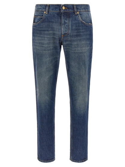 Jeans by Dolce & Gabbana for men in denim cotton blue & gold presents a refined pantology silhouette, artfully defined by a refined pantology straight-leg, long, and a sophisticated .