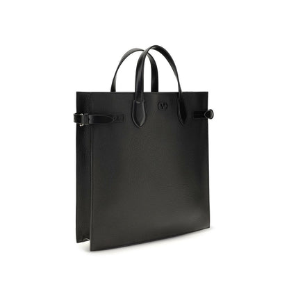Medium 2-in-1 Shoulder & Crossbody Shopper Bag by Valentino Garavani for men in bos taurus calf nappa leather black & palladium features a effortless chic silhouette with a secure , ample , and versatile crossbody-strap, shoulder-strap, handle & adjustable-strap for a effortless chic finish.