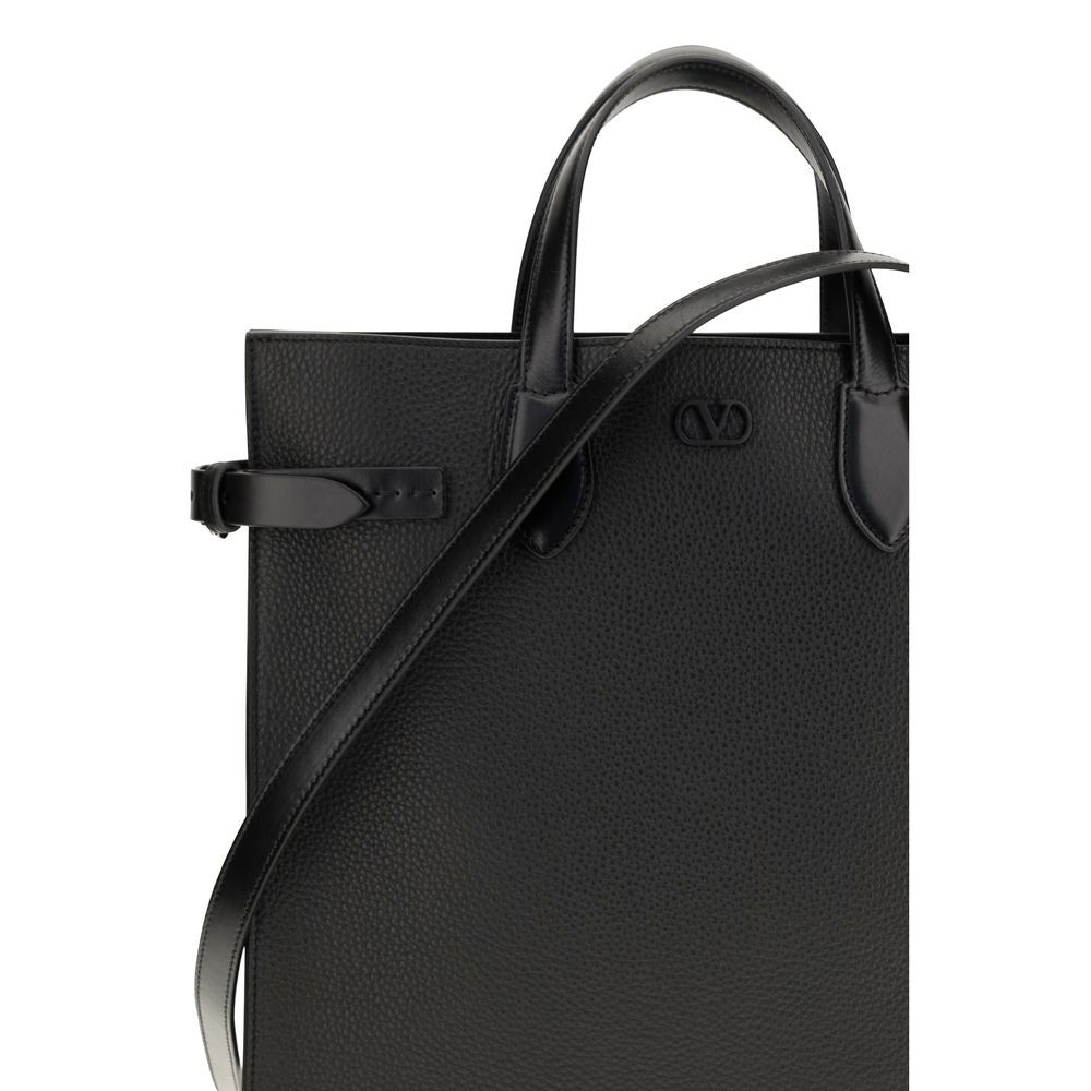 Medium 2-in-1 Shoulder & Crossbody Shopper Bag by Valentino Garavani for men in bos taurus calf nappa leather black & palladium features a effortless sophistication silhouette, secured by a with ample and versatile crossbody-strap, shoulder-strap, handle & adjustable-strap for a effortless sophistication finish.