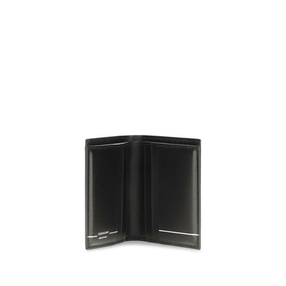 Cardholder Wallet by Ferragamo for men in bos taurus calfskin leather black & silver showcases a refined silhouette, artfully detailed with the signature style of the Gancini Bos Taurus Calfskin Leather Cardholder Wallet and functional card-organization bifold.
