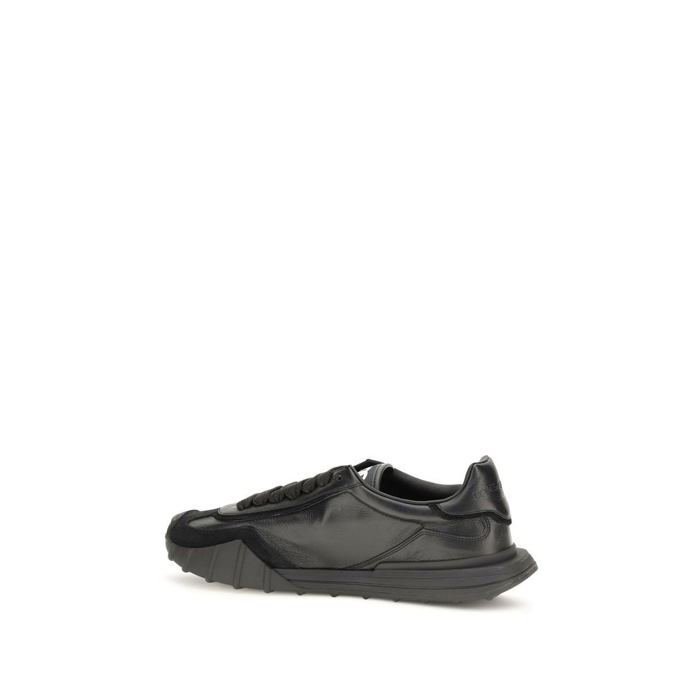 Athletic Sneakers by Dolce & Gabbana for men in tu & bos taurus calf leather black & signature showcases an impeccable silhouette, defined by an impeccable athletic style design that perfectly captures the essence of the Men's Athletic TU & Bos Taurus Calf Leather Sneakers.