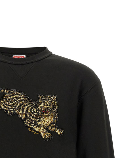 Sweatshirt by Kenzo for men in cotton sequins black showcases a slouchy chic silhouette, artfully detailed with a slouchy chic and for a slouchy chic finish.