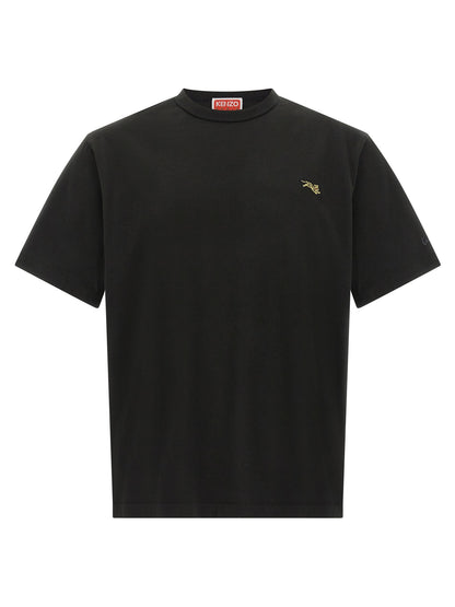 T-Shirt by Kenzo for men in cotton black, gold & signature showcases a unassuming silhouette, artfully detailed with a refined and unassuming for a sophisticated, contemporary look.