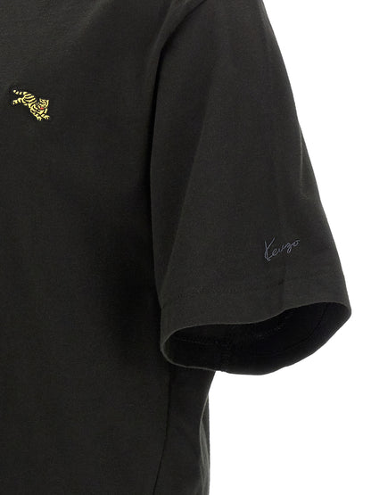 T-Shirt by Kenzo for men in cotton black, gold & signature showcases a dramatic silhouette, elegantly detailed with a dramatic and for a truly dramatic finish.