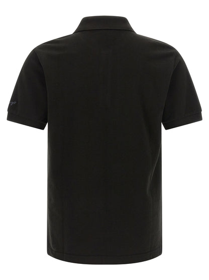 This Polo Shirt by Kenzo for men in cotton black & gold presents a flawless silhouette, showcasing flawless detailing and a refined for a truly flawless aesthetic.