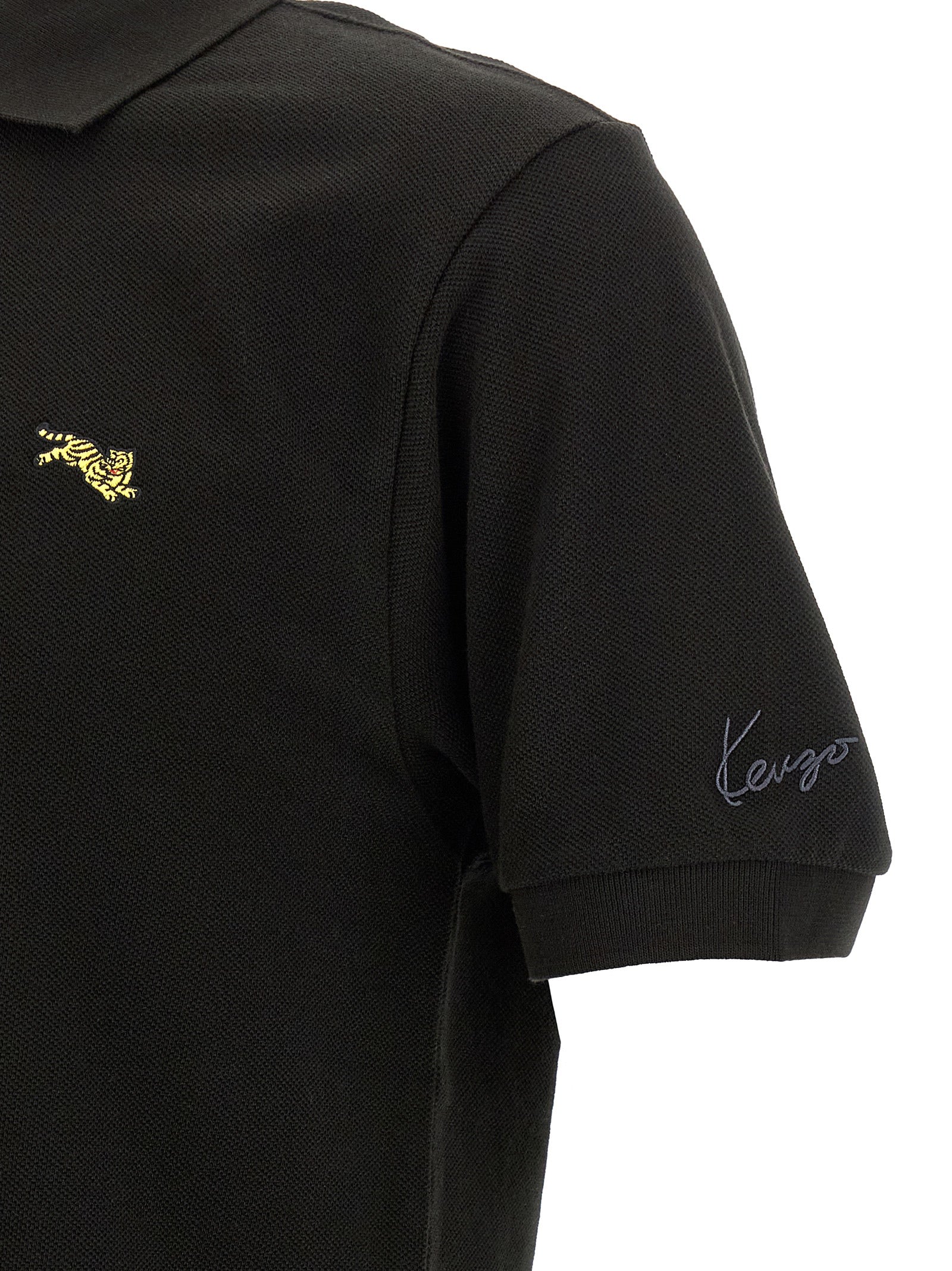 Polo Shirt by Kenzo for men in cotton black & gold presents a crisp silhouette, artfully detailed with a crisp and crisp .