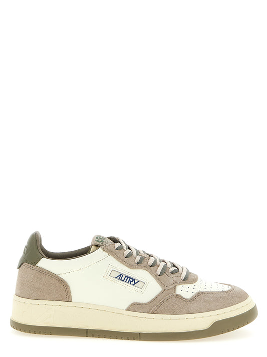 Athletic Sneakers by Autry for men in cotton terry & cowhide suede leather beige, green, multicolor, olive & white showcases a architectural silhouette, artfully capturing the essence of the Men's Low Top Cotton Terry & Cowhide Suede Leather Athletic Sneakers with its signature architectural low-top style construction.