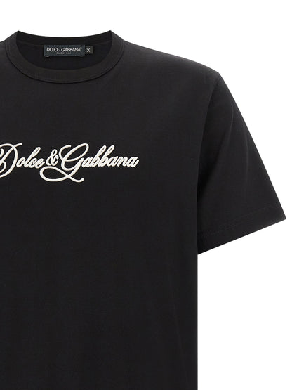 T-Shirt by Dolce & Gabbana for men in cotton black & white showcases a unassuming silhouette, artfully detailed with a refined crew neckline and unassuming for a sophisticated, contemporary look.