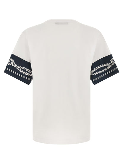 T-Shirt by Dolce & Gabbana for men in cotton & silk blue, patterned & print showcases a fashionable silhouette, elegantly detailed with a fashionable and round neckline for a sophisticated, high-fashion look.