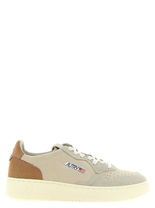 Athletic Sneakers by Autry for men in suede leather brown, cream & multicolor showcases a architectural silhouette, artfully capturing the essence of the Men's Athletic Suede Leather Sneakers with its signature architectural athletic style construction.