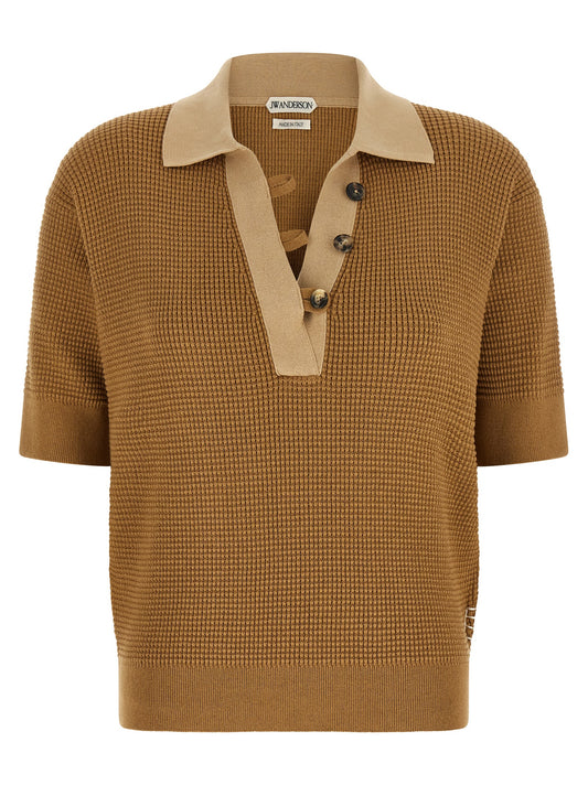 Polo Shirt by J.W.Anderson for women in cashmere cotton blend beige & signature showcases a sharp silhouette, detailed with a refined turtle v-neck neckline and sharp short-sleeve for a sophisticated finish.