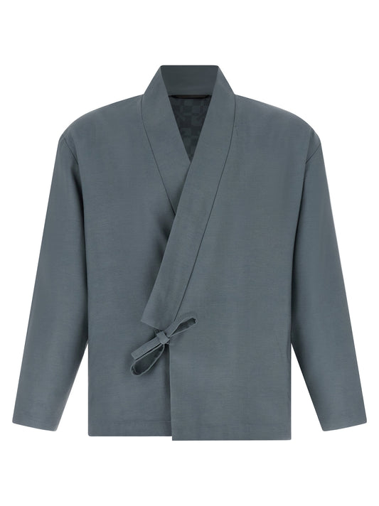 This Blazer by Kenzo for men in viscose wool gray presents a tailored silhouette, meticulously tailored with a tailored wrap v-neck neckline and distinctive for a tailored finish.