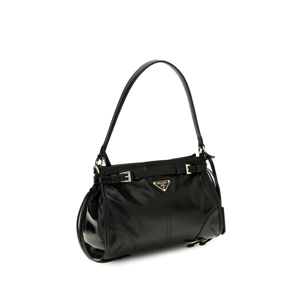 Small Shoulder Hobo Handbag by Prada for women in bos taurus calf leather black presents a ornamental silhouette, showcasing a secure zipper, ample , and versatile shoulder-strap, handle, adjustable-strap, detachable-strap & belt-strap for a ornamental finish.