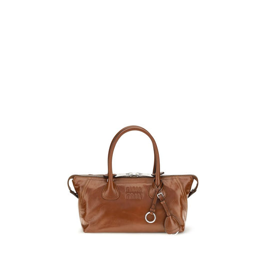 Handbag by Miu Miu for women in bos taurus calf leather & satin cotton brown features a exquisite silhouette, showcasing a secure zipper and exquisite with versatile shoulder-strap, handle, adjustable-strap & detachable-strap for a exquisite finish.