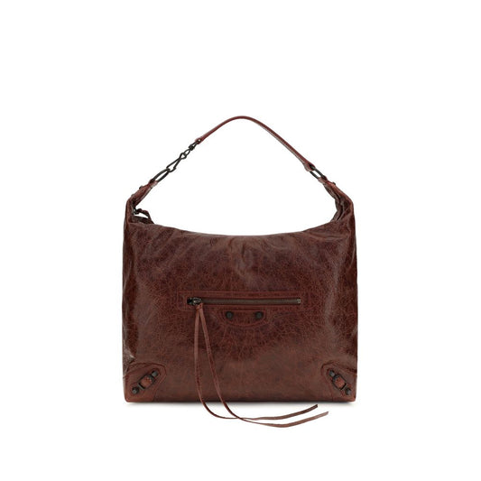 Quilted Crossbody Half Moon Shoulder Bag by Balenciaga for women in lambskin leather & cotton canvas bordeaux features a effortless chic silhouette with a secure zipper, ample , and versatile crossbody-strap, shoulder-strap, adjustable-strap & handle for a effortless chic finish.
