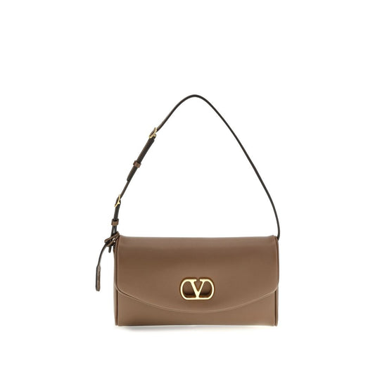 Compact Shoulder Bag by Valentino Garavani for women in bos taurus calfskin nappa leather brown & signature features a effortless chic silhouette with a secure magnetic, ample single-compartment, and versatile shoulder-strap, adjustable-strap & handle for a effortless chic finish.