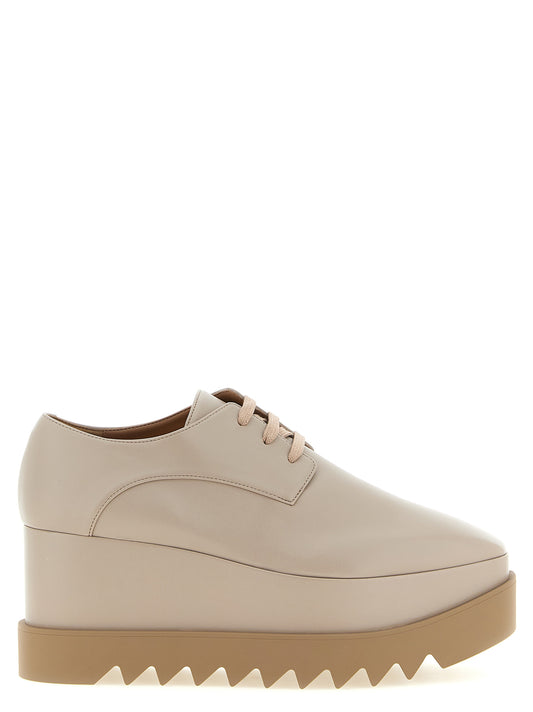 Flat Shoes by Stella McCartney for women in eva beige showcases a dynamic silhouette, artfully capturing Women's EVA Flat Shoes through its distinctive and elegant square toe style.