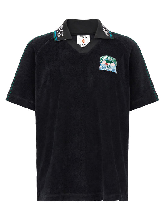 Polo Shirt by Casablanca for men in cotton terry cloth black, green & white presents a distinguished silhouette, showcasing a sophisticated v-neck neckline and distinguished for a truly distinguished finish.