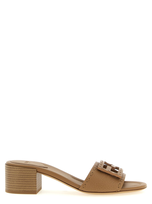 Flat Slider Sandals by Fendi for women in calfskin leather beige & patterned showcases a sculptural silhouette as Selleria Women's Calfskin Leather Flat Slider Sandals, defined by a sculptural flat and sculptural for a sculptural look.