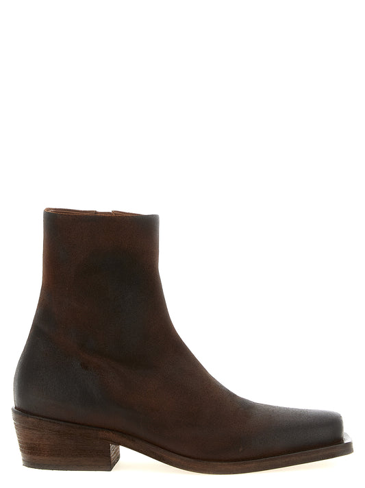 Ankle Cowboy Boots by Marsell for men in calfskin leather & wood brown features an high-performance silhouette, showcasing the sophisticated design of the Men's Calfskin Leather & Wood Ankle Cowboy Boots with a and a refined square toe style.